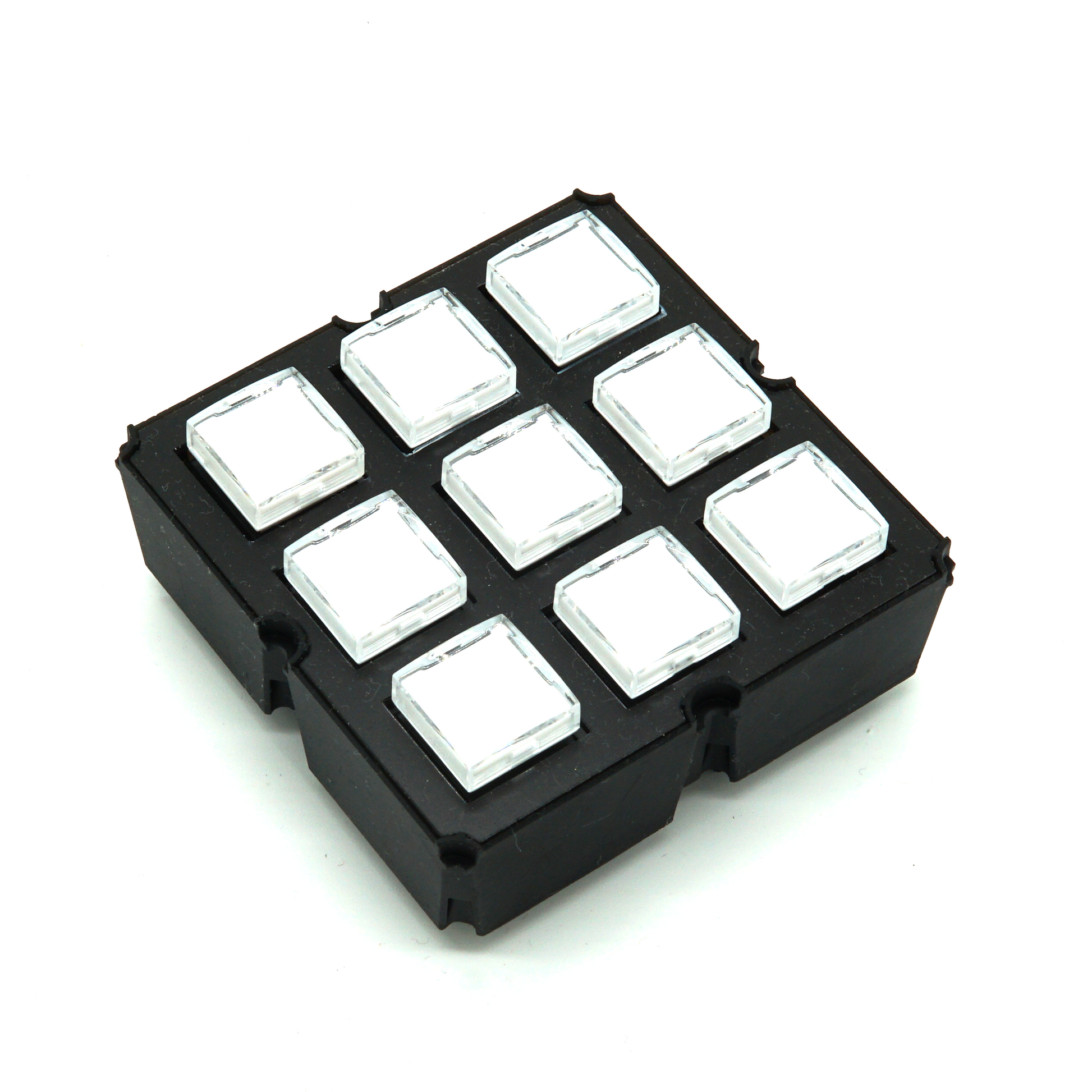 3×3 Keymatrix module with nine white keys, customizable labels, and green LED backlight on white background in isometric view – modular sim racing and flight sim button box control.