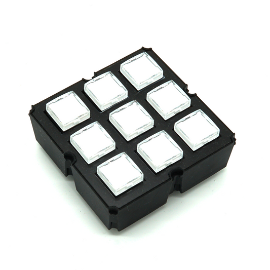 3×3 Keymatrix module with nine white keys, customizable labels, and green LED backlight on white background in isometric view – modular sim racing and flight sim button box control.