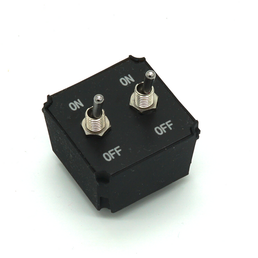 Small Dual Toggle Switches module with two compact toggles on white background in isometric view – ON-OFF variant for sim racing and flight sim button boxes.