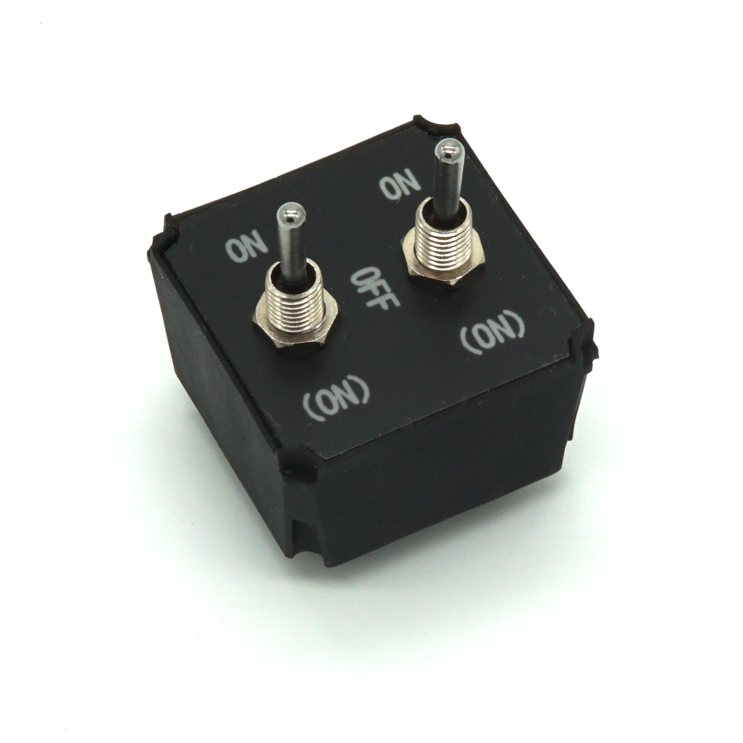Small Dual Toggle Switches module with two compact toggles on white background in isometric view – (ON)-OFF-ON variant for sim racing and flight sim button boxes.